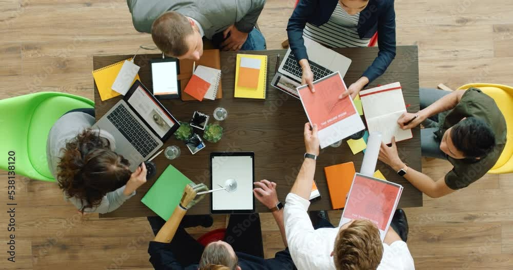 Poster planning, startup teamwork or collaboration of above meeting working with technology in design offic