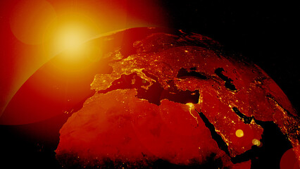 Earth globe at night illuminated by hot sun