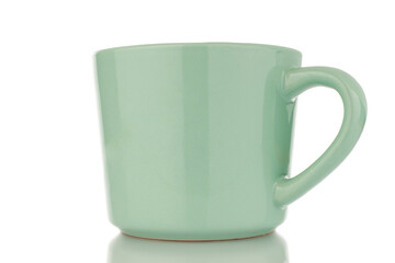 One ceramic cup, macro, isolated on white background.