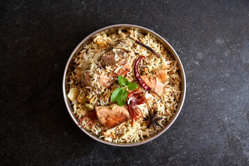 Delicious mutton biryani top view.Biryani rice dish Beautiful Indian rice dish.Delicious spicy...