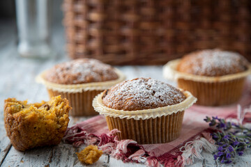 Homemade cupcakes on a light wooden table