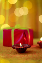 Happy Diwali - Diya lamps lit during diwali celebration