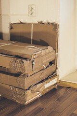 Packed furniture in cardboard boxes.