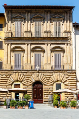 Fototapeta na wymiar Exterior of an old city palace in the center of Florence, Italy, Europe