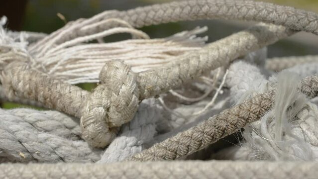 Closer look of the white rope on the ground used for fishing nets in Estonia