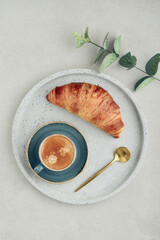 Croissant and a cup of coffee