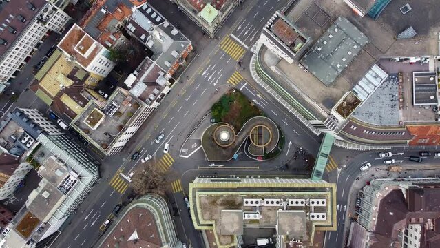 Zurich, Switzerland: Aerial overhead drone footage of the street of Zurich business and financial district in Switzerland largest city. 