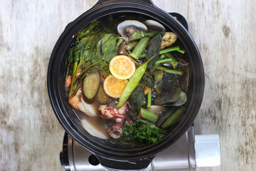 Seafood Guava Sinigang served in a dish isolated on grey background side view of stewed