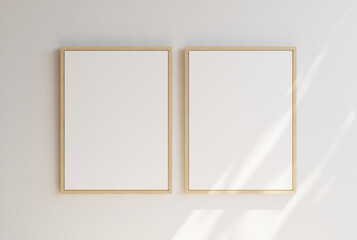 Pair of empty wooden picture frames on white plain wall. Template for your content. 3D illustration.