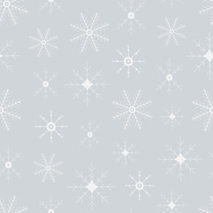 Fototapeta na wymiar Seamless pattern of snowflakes. Hand drawn winter background. Doodle Christmas snowflakes vector print