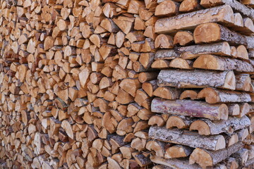 stacked dry firewood as a background