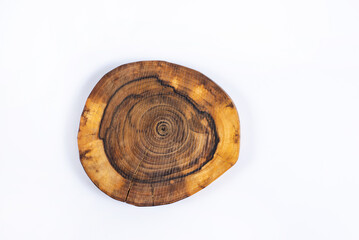 A cut of a tree. Annual rings on trees. Texture. On a white background