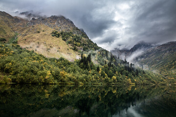 mountain landscape with lake and clouds