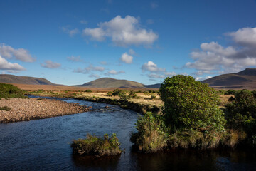 Obraz premium The Owenduff River, impressive landscape of the vast and remote peatlands at the edge of Wild Nephin National Park, co. Mayo, Ireland.