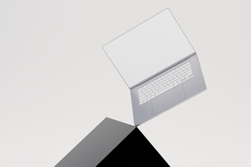 work at the laptop. laptop balancing on a gray cube on a white background. 3D render
