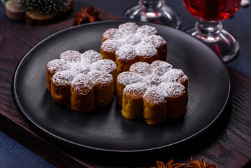 Hot mulled wine with a slice of orange, with cinnamon, cloves and other spices