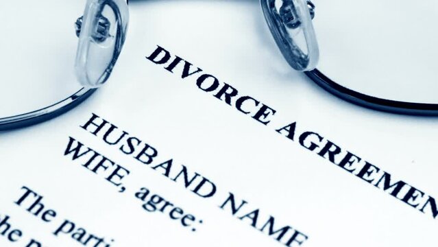 Close up of divorce agreement dolly shot