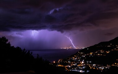 Lightning Strikes over the bay of Naples in front of Vesuvius, at night