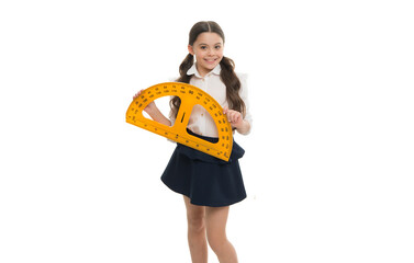 Happy pupil holding big protractor studio isolated on white, school. Teen girl back to school