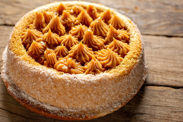 churros cake with dulce de leche topping with