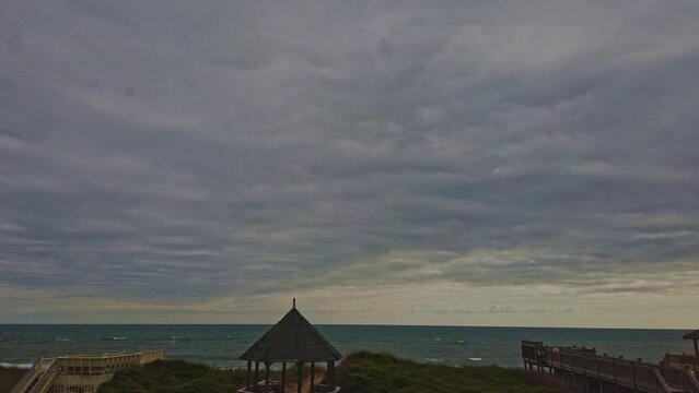 Timelapse Of Storm Clouds Over The Ocean With Waves Crashing