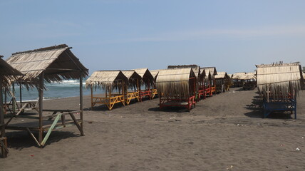 beach huts on the shore