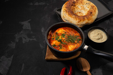 shakshuka on a dark background