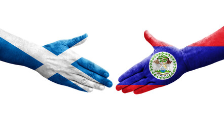 Handshake between Belize and Scotland flags painted on hands, isolated transparent image.