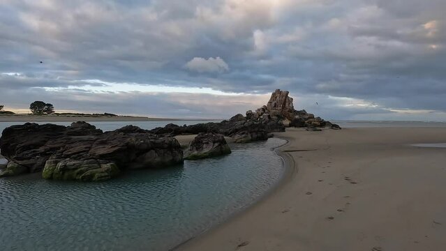 Beautiful day view of Rapanui, Shag Rock at Christchurch, New Zealand.