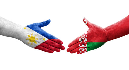 Handshake between Belarus and Philippines flags painted on hands, isolated transparent image.