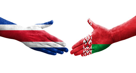 Handshake between Belarus and Costa Rica flags painted on hands, isolated transparent image.