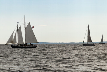 Fototapeta premium sailboats with 4 sails hoisted on the sea