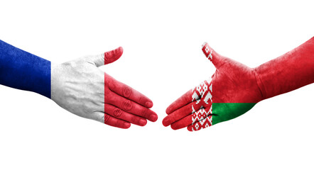 Handshake between Belarus and France flags painted on hands, isolated transparent image.