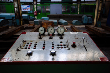 Control panel with buttons and pressure gauge