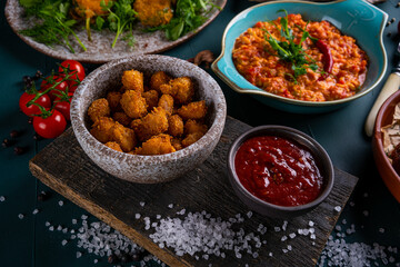 chicken nuggets on a plate in a restaurant