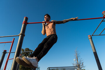 sportsman doing outdoor gymnastics, athlete, calisthenics