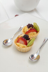 appetizing dessert decorated with strawberries, blackberries and pastry cream, pastry wallpaper, elegant gourmet dish