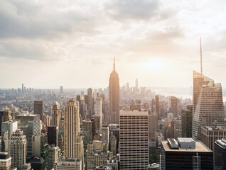 Fototapeta premium New York skyscraper towers at sunset aerial view