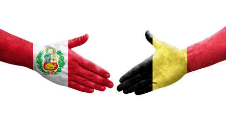 Handshake between Belgium and Peru flags painted on hands, isolated transparent image.