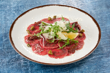 beef carpaccio with lemon and parmesan