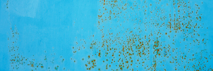 Old rusty metal texture. Rust on the surface of the iron wall. Panoramic background for grunge design.