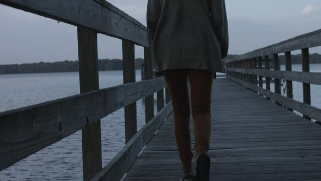 Young Woman Enjoys Sights on Dock at Reelfoot Lake State Park 4K