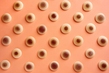 eye candy in a row or pattern orange background