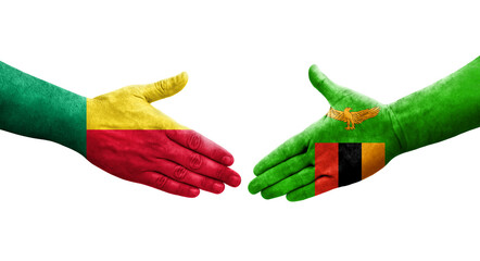 Handshake between Benin and Zambia flags painted on hands, isolated transparent image.