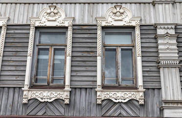 Fototapeta na wymiar Facade of an old wooden building