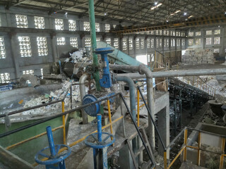 Dandeli, Karnataka, India - 16th May 2019 : Pulper or pulping machine inside paper manufacturing plant. Paper pulp is being extracted from used papers for making fresh paper, saving environment.