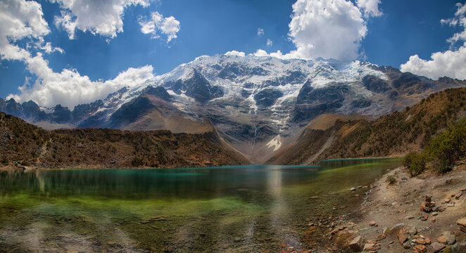 Panoramic image of the Laguna Humantay near Cusco in the Peruvian Andes at an altitude of 4200 meters.