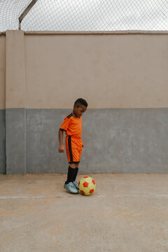 Child playing football