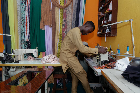 Boy sewing 