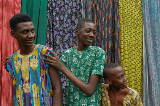 African brothers looking back and smiling together